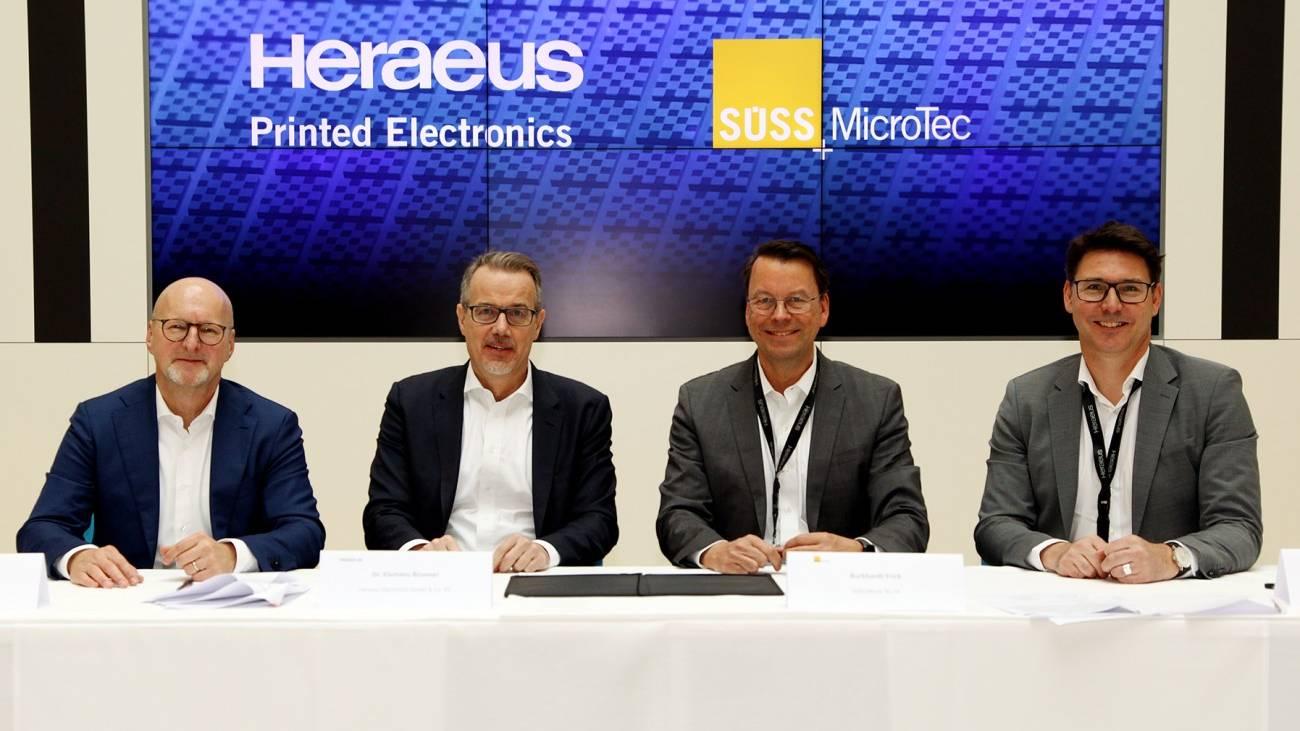 Executives from Heraeus and SUSS