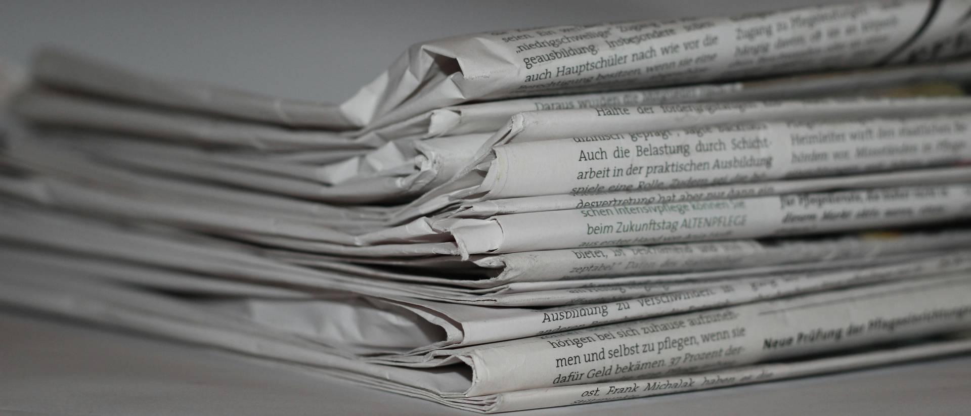 A stack of newspapers, generic news image