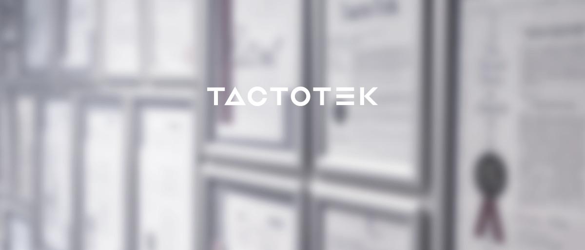 TactoTek company logo with a blurred wall of patents in the background