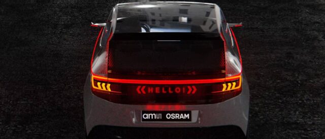 A car seen from behind with a modern lighting panel and the ams OSRAM logo