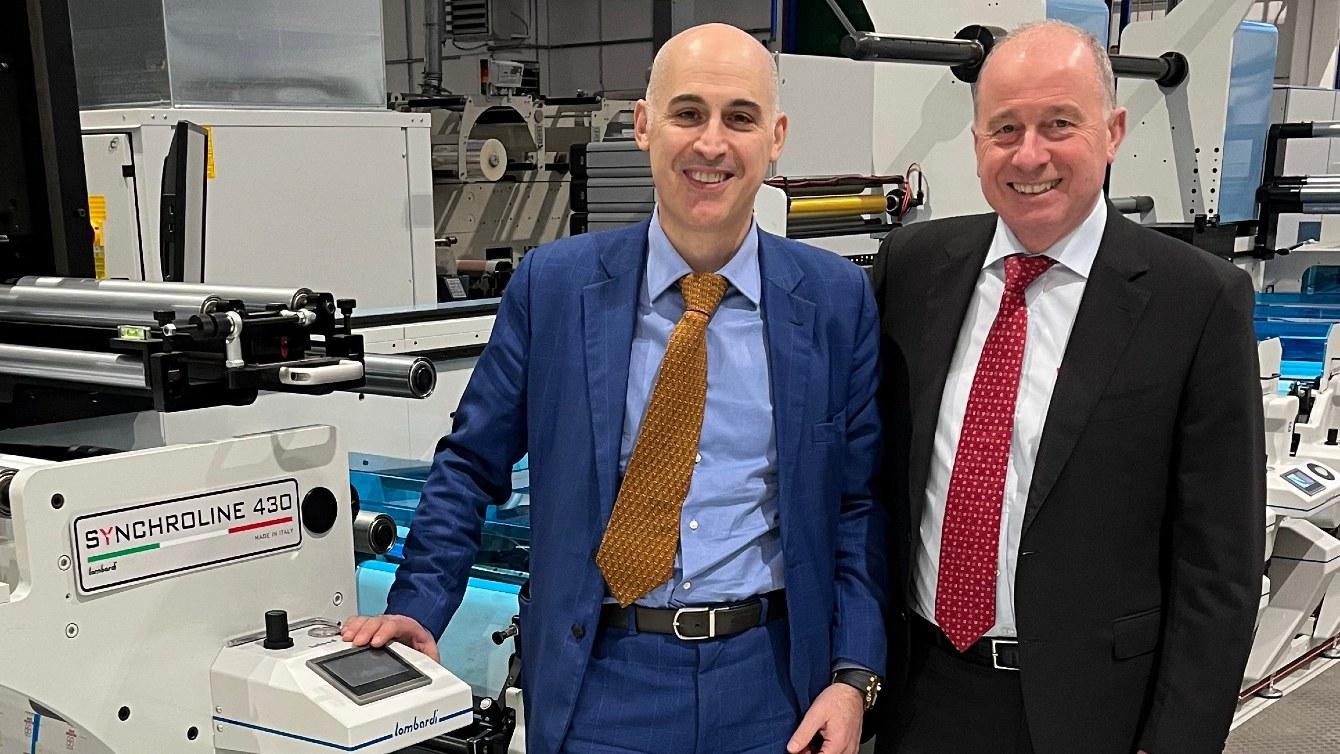 Ivan Caldirola and Giuseppe Rossi with one of Minova Labels’ Lombardi Synchroline 430 presses