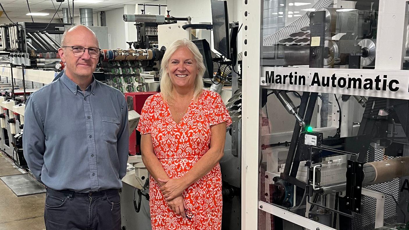 Zenna Parfaniuk and Jamie Hyde with The Label Makers’ new Martin Automatic MBS fitted to an MPS flexo press