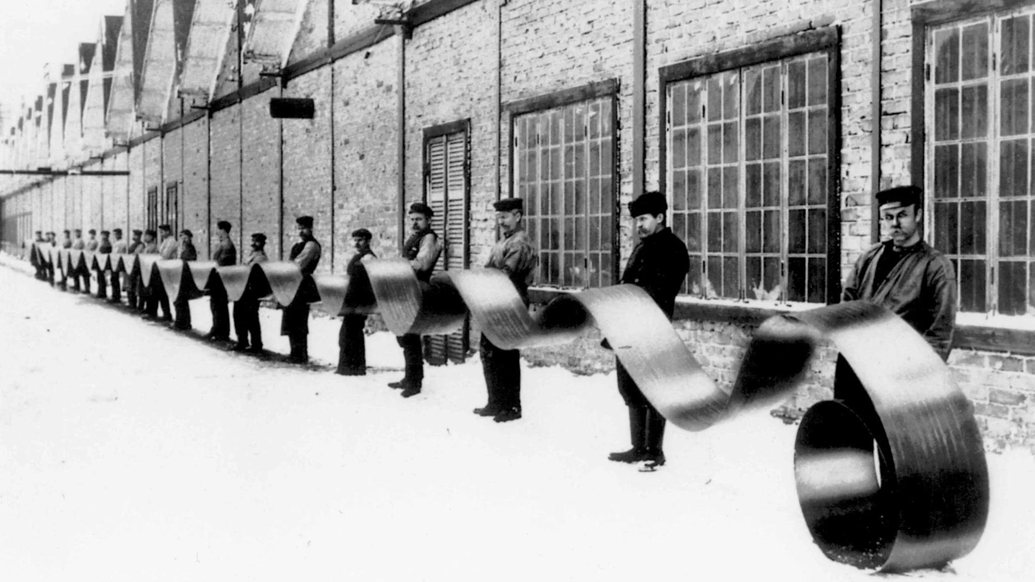 Historic black and white image of IPCO steel bands